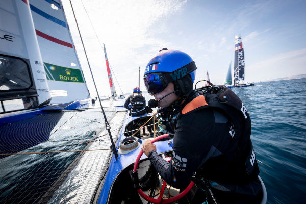 SailGP F50 foiling catamaran racing at full speed